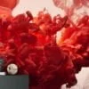 Crimson Ink in Water Wallpaper - Abstract Red Liquid Design for Bold Wall Decor