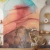 Experience the mesmerizing beauty of mixed alcohol ink colors dancing in water with our captivating wallpaper design