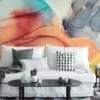 Experience the mesmerizing beauty of mixed alcohol ink colors dancing in water with our captivating wallpaper design